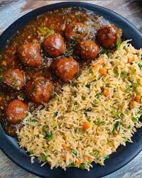 Veg Fried Rice With Manchurian Ball Gravy